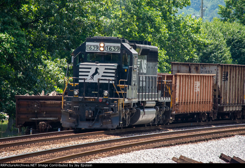 NS 1639 heads up a work train at Oneida 